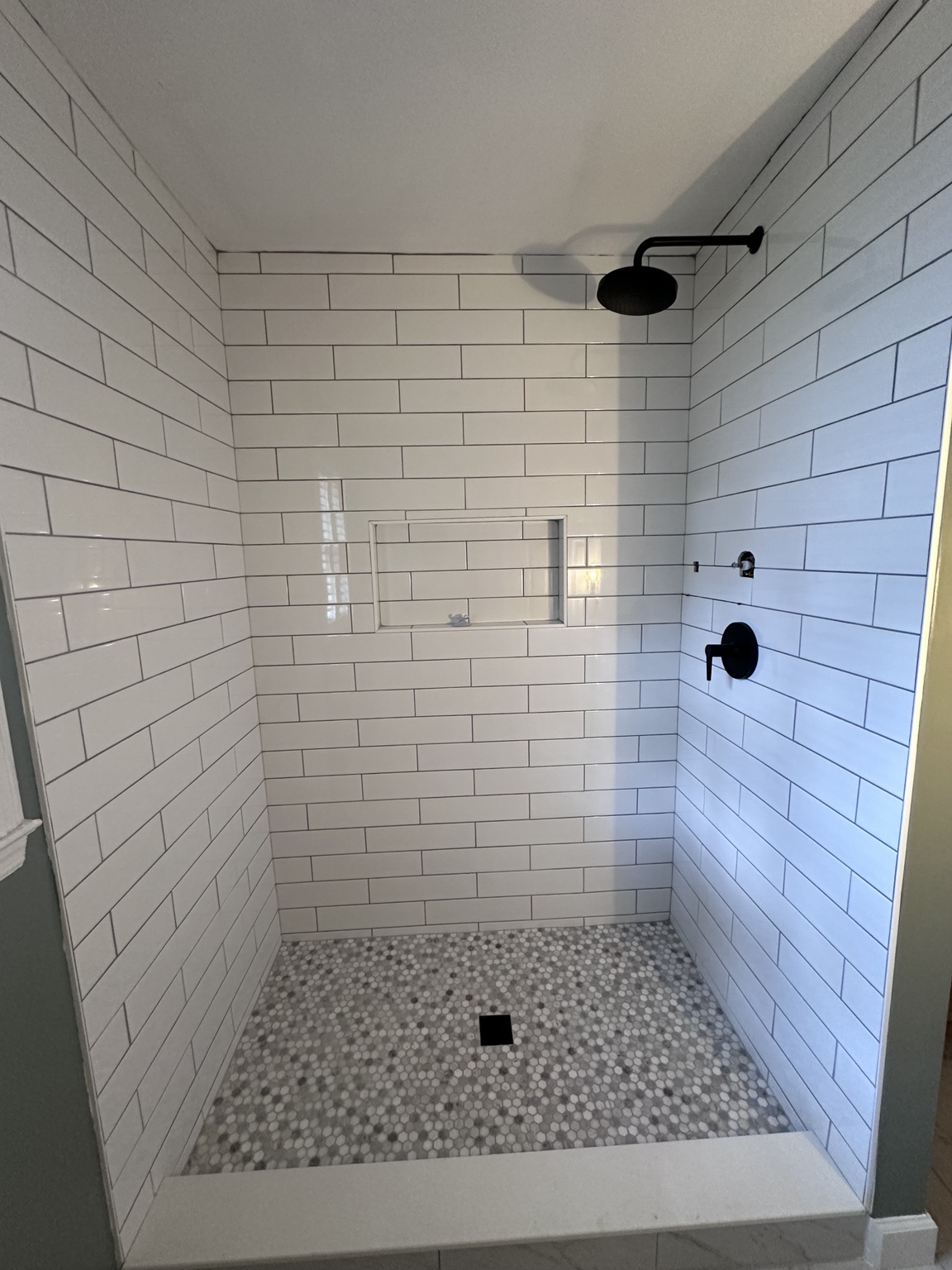 Custom tiled shower by Alexander's Tile & Home Renovations